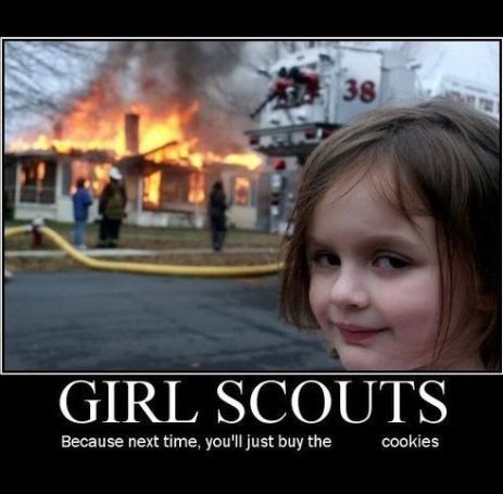 A picture of a little girl by a burning house has a caption that implies she burned the house because the owners didn't buy girlscout cookies from her.